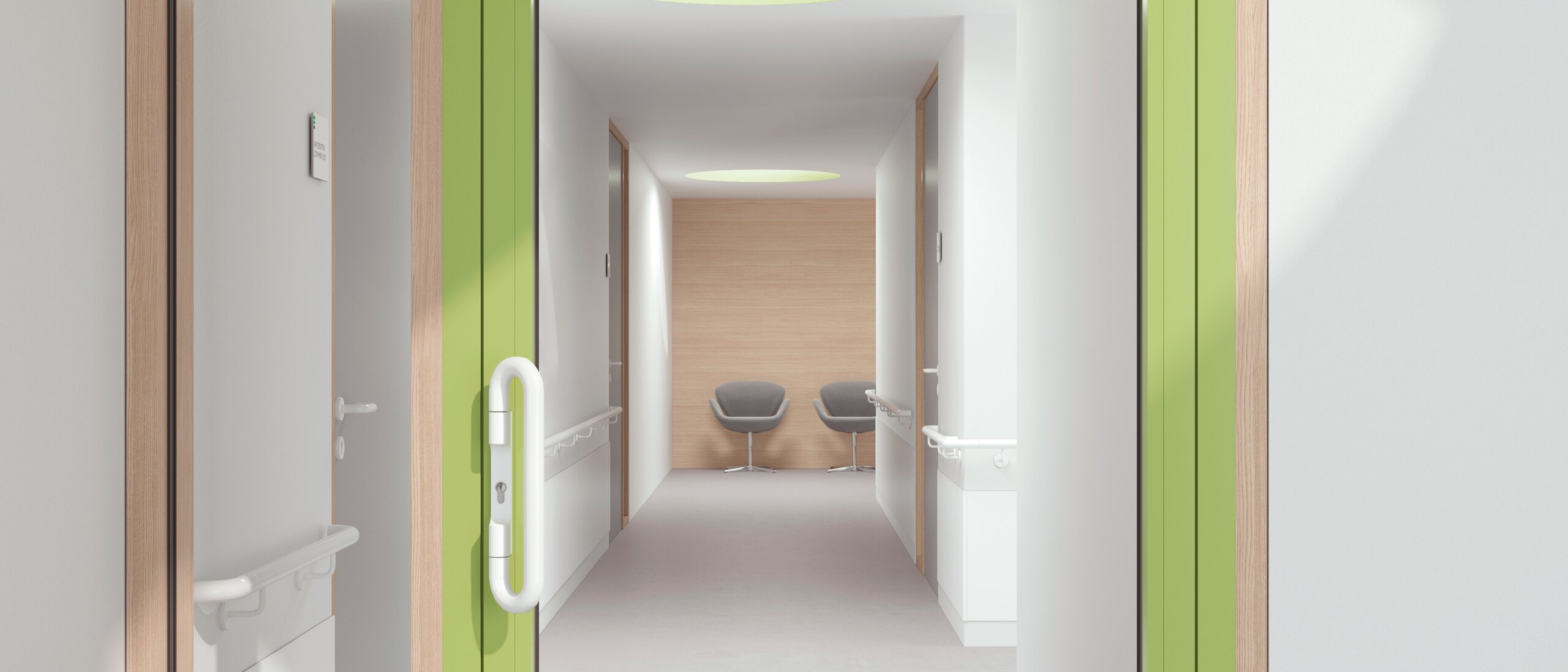Verglaste Krankenhaustür mit grünem Rahmen ausgestattet mit HEWI Drückergriff in Signalweiß aus Polyamid