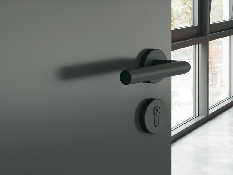 Door handle key escutcheon in the colour black matt made of polyamide