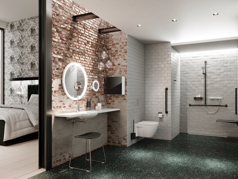 Barrierefreies Hotelbadezimmer mit Waschplatz, Duschbereich und WC, ausgestattet mit HEWI System 900 in Schwarz matt