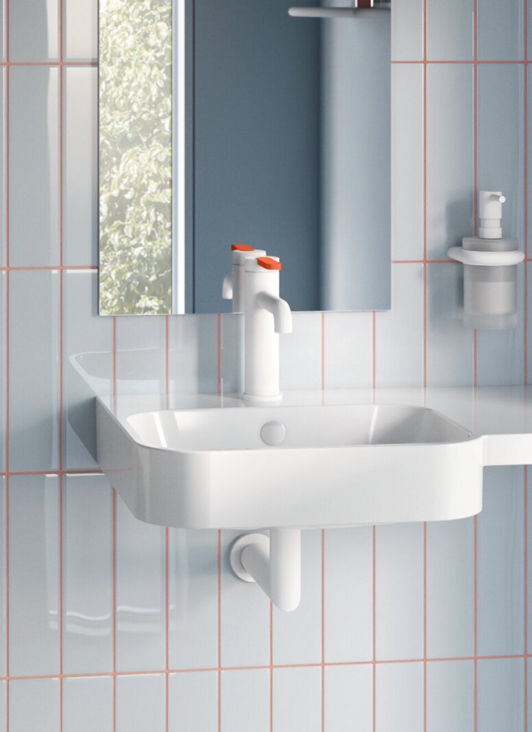 HEWI Fittings AQ Washbasin WC with a hinged support rail on the side and a support rail behind the WC in a bathroom with high levels of accessibility and a compact washbasin