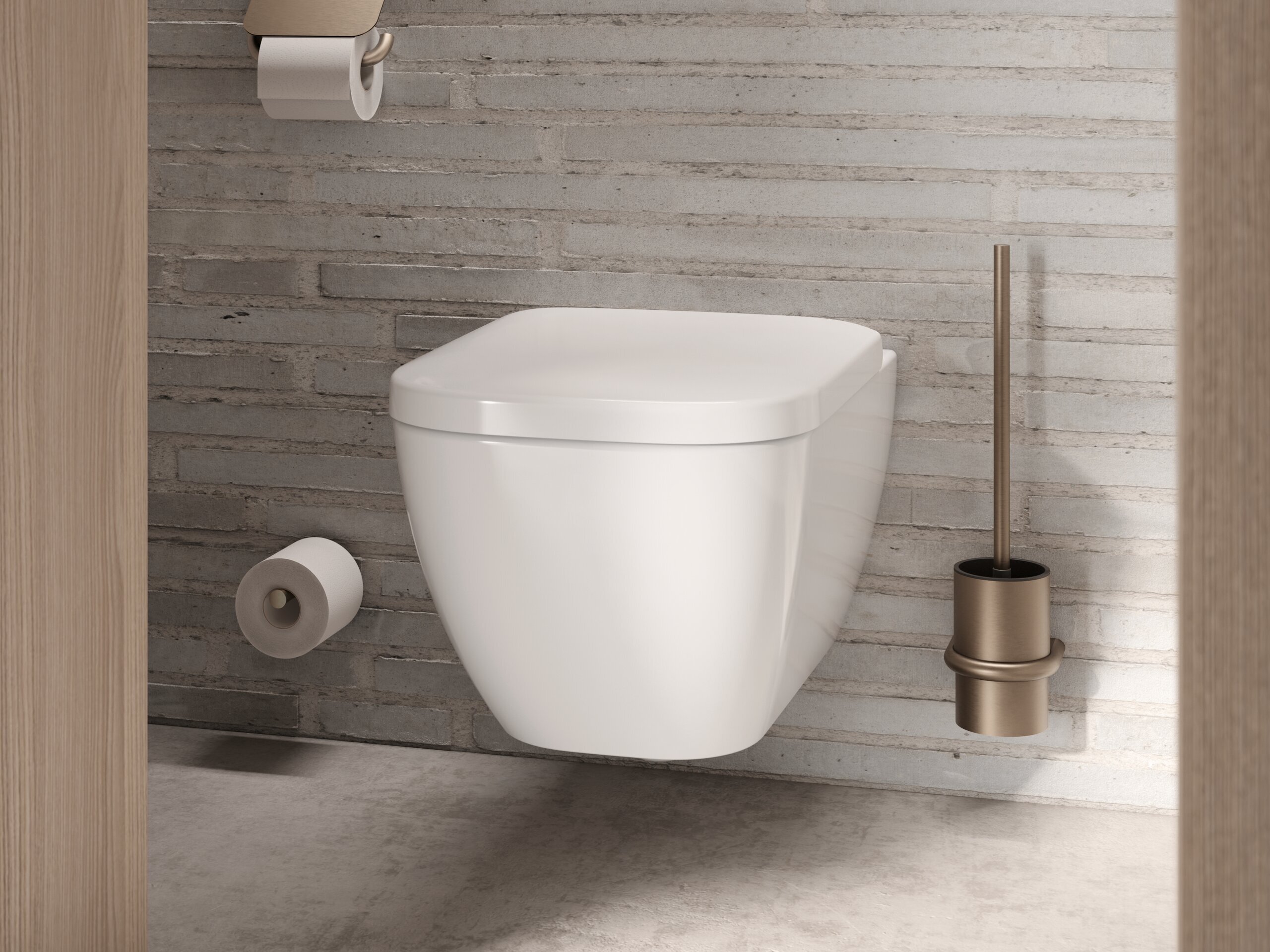 Wall-hung WC with a bronze-coloured PVD coating on the toilet brush, the toilet roll holder and the spare roll holder