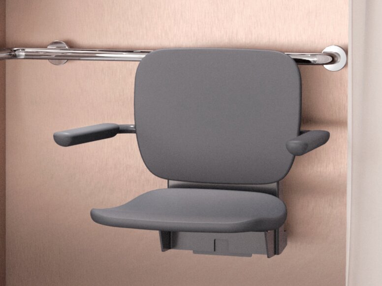 HEWI Range 802 LifeSystem Interior A shower seat with a backrest in the shower area, as well as a WC in the bathroom fitted with a hinged support rail and a washbasin with a stool
