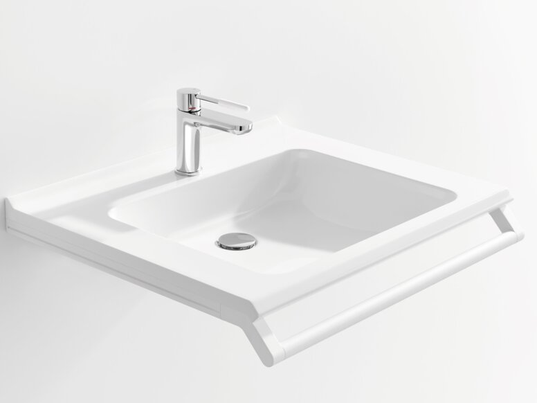 Weißer Waschtisch mit einer rechteckigen Beckenmulde, einem verchromtem Wasserhahn und einem Haltegriff an der Vorderkante